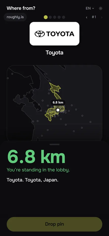 The reveal: Japan lit up on the map, with the distance from the pin to the headquarters